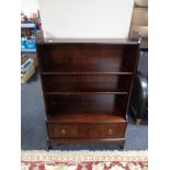 A set of Stag open bookshelves fitted a drawer