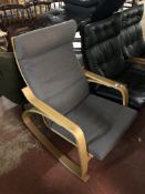 A mid century oak framed relaxer chair