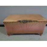 A pink loom blanket box