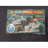 A vintage Scalextric Grand Prix 8 racing set