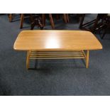 An Ercol ash coffee table with under stretcher CONDITION REPORT: 104cm long by 46cm