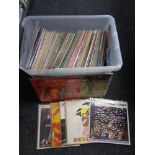 A box of large quantity of motion picture and sound track vinyl records.