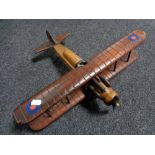 A wooden propeller plane