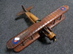 A wooden propeller plane