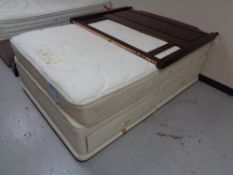 A Sealy Posturepaedic 4'6 interior with storage divan minstral headboard