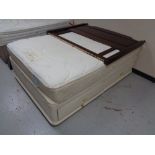 A Sealy Posturepaedic 4'6 interior with storage divan minstral headboard