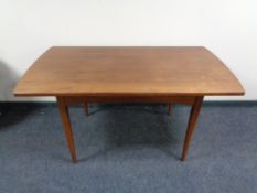 A mid century teak pull out dining table CONDITION REPORT: Unextended this is 138cm