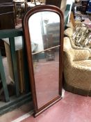 A mahogany framed hall mirror, width 49 cm, height 130 cm.