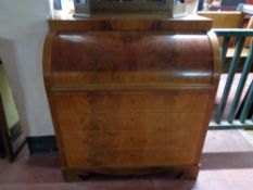 An early twentieth century mahogany cylinder bureau