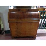 An early twentieth century mahogany cylinder bureau