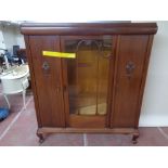 An early twentieth century mahogany display cabinet