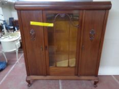 An early twentieth century mahogany display cabinet