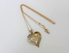 A 10ct yellow gold diamond heart pendant on yellow gold chain, approximately 0.25ct.