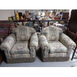 A four piece lounge suite comprising of three seater and three armchairs