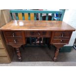 A nineteenth century mahogany writing table