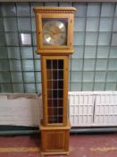 A twentieth century Junghans light oak regulator clock