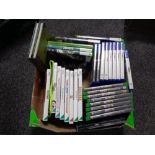 A box of Play Station 4 games, Xbox 360 games,