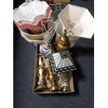 A box of decorative table lamps and shades