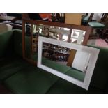 An Edwardian oak framed mirror together with painted mirror
