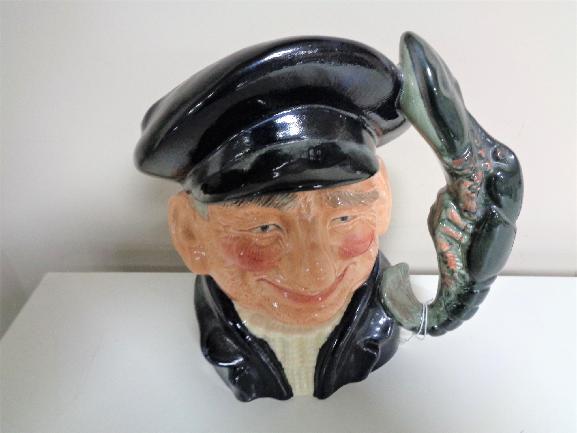 A Royal Doulton character jug,