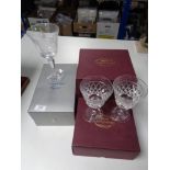 Four boxed crystal glasses and goblets,