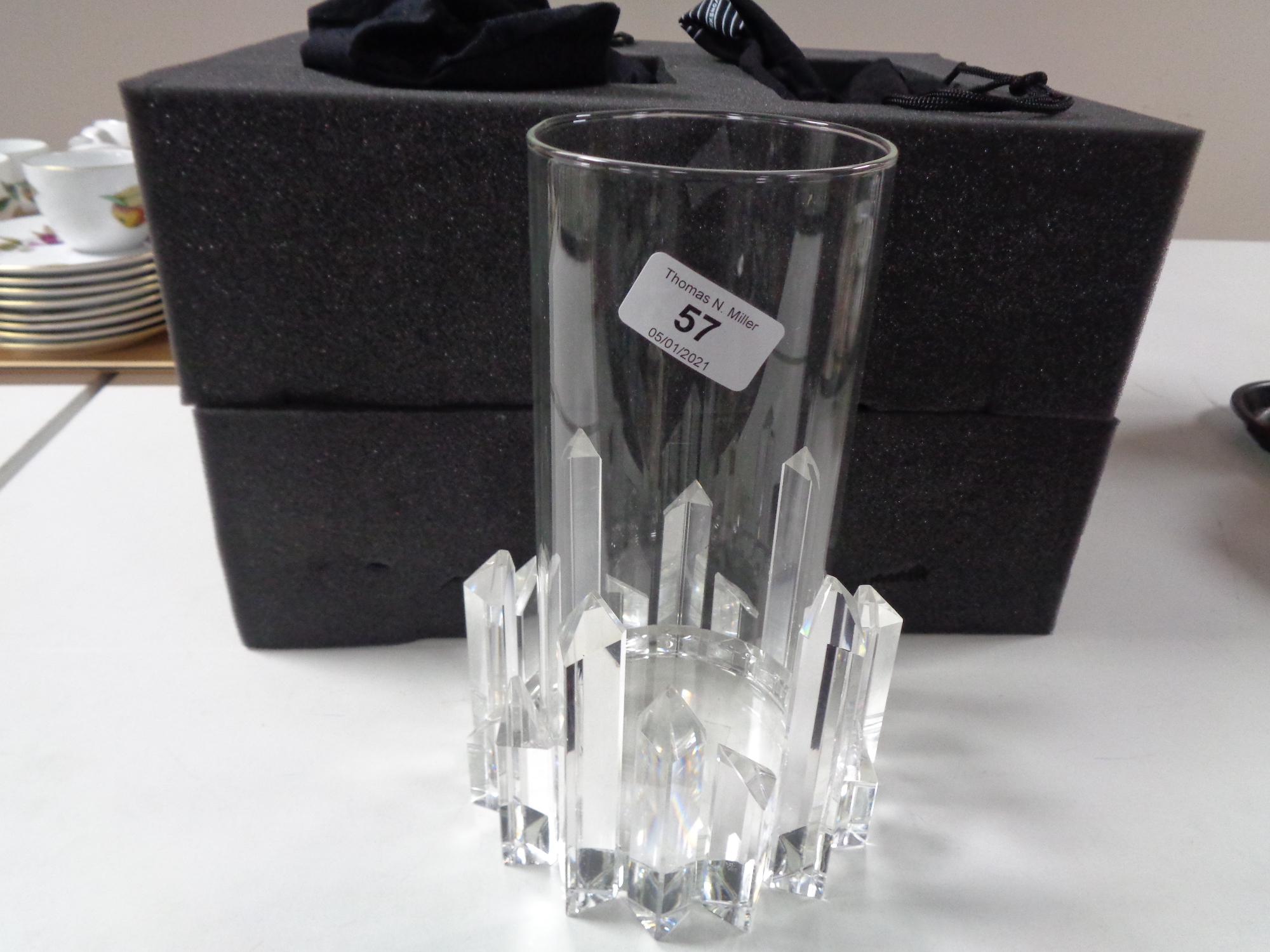 A Luxenoa Round Shard iced glass candle holder in retail packaging with dust covers