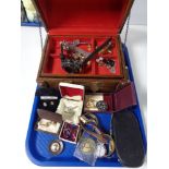 A casket of costume jewellery, wrist watches,