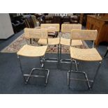 A set of four contemporary bergere seated breakfast bar stools