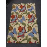 A chain stitched rug with flowers and butterflies 130 cm x 86 cm