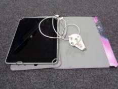 A 32Gb Ipad in protective case with charger