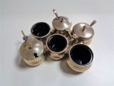 Six silver condiment pots (6)