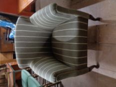 A contemporary striped armchair