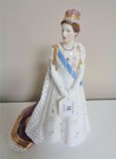 A Royal Worcester figure, Her Royal Highness Princess Margaret in her coronation robes,