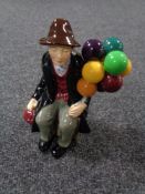 A Royal Doulton figure - The Balloon man HN 1954