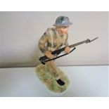 A Coalport figure, For King and Country The Soldier, limited edition number 451 of 1500.