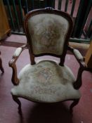 A continental walnut tapestry seated salon chair