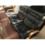 A pair of black leather relaxer chairs CONDITION REPORT: General minor scuffs and
