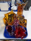 A tray of art glass vases and bowls