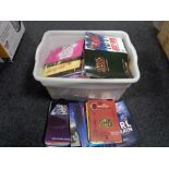 A box of theatre programmes from around the UK
