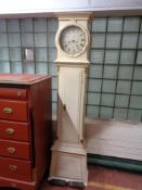 A nineteenth century painted longcase clock with pendulum and two weights