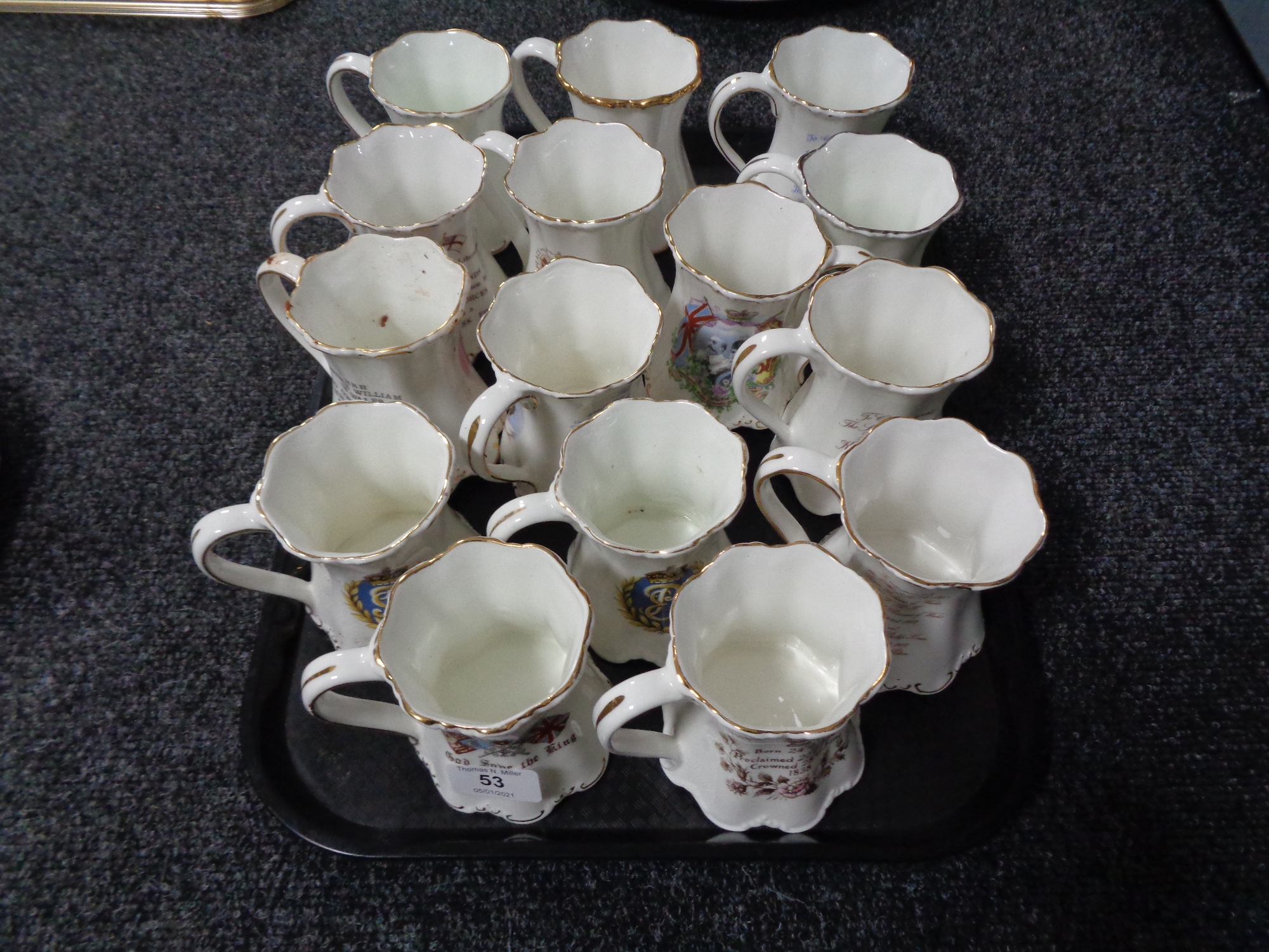 A collection of commemorative cups,
