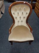 A Victorian style lady's chair in buttoned dralon