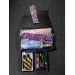 A collection of new gent's ties and braces.