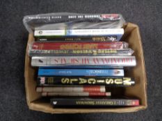 A box of books including musicals,