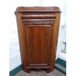 A nineteenth century mahogany corner cabinet