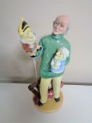 A Royal Doulton figure, Punch and Judy Man,