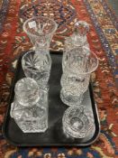 A pair of heavy cut-glass decanters, with stoppers,