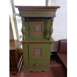 A nineteenth century painted cabinet fitted with cupboards