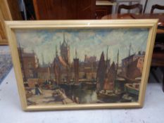 A twentieth century framed oil on canvas - figures in a harbour