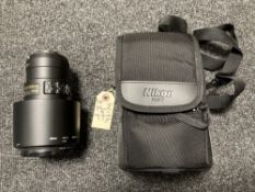 A Nikon AF-S Nikkor 300 mm f/4E PF ED VR lens, with lens cap, with original purcase receipt, boxed,